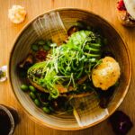 green beans and vegetable salad on brown bowl