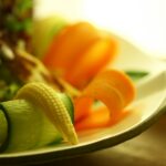 sliced cucumber on white ceramic plate